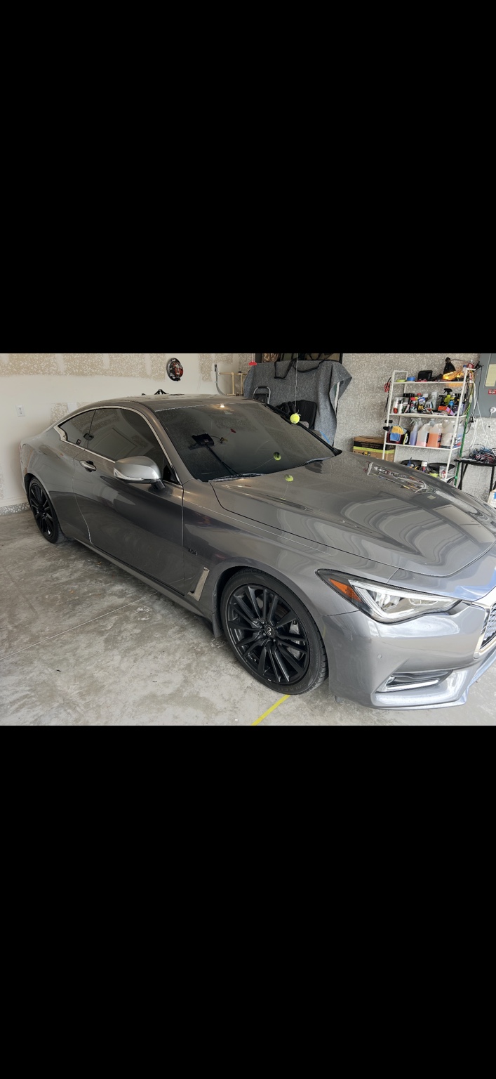 Gray Infiniti coupe with professionally tinted windows