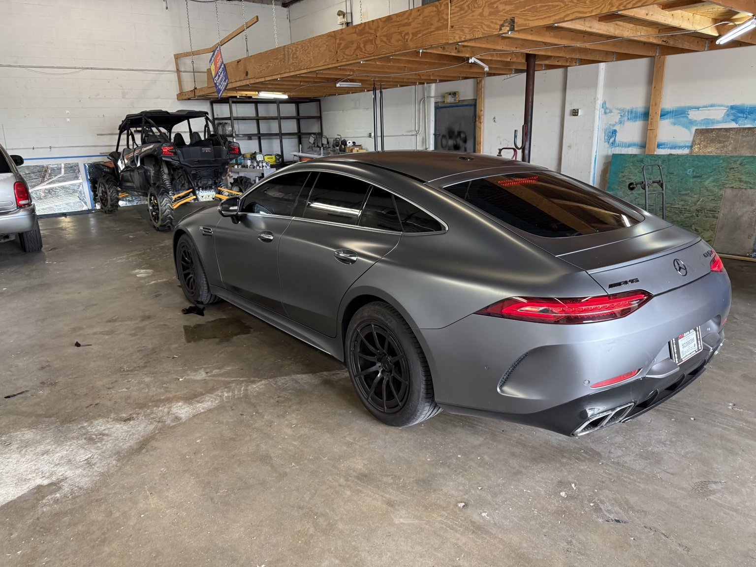 Gray Mercedes coupe with dark side and rear window tint