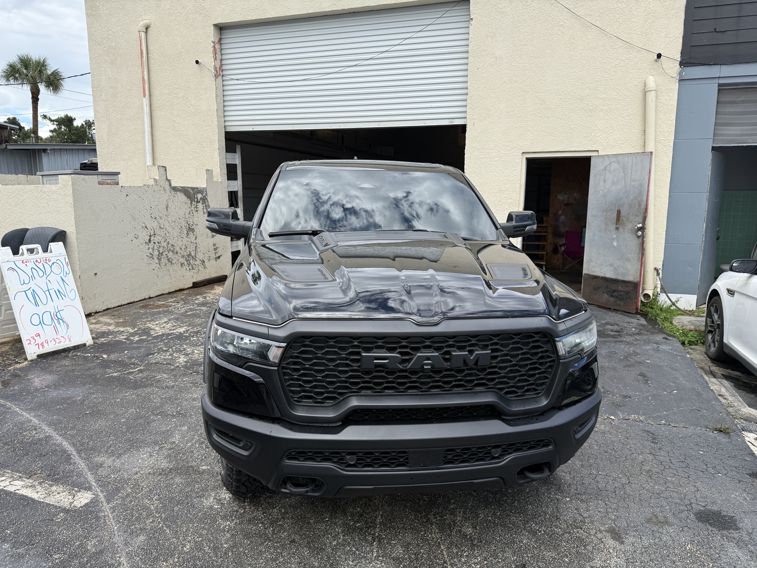 Black Ram truck with tinted windshield