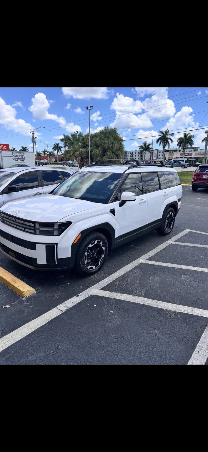 White Hyundai SUV with professionally tinted windows
