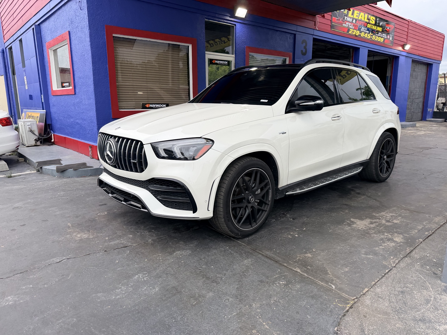 White Mercedes SUV with professionally tinted windows